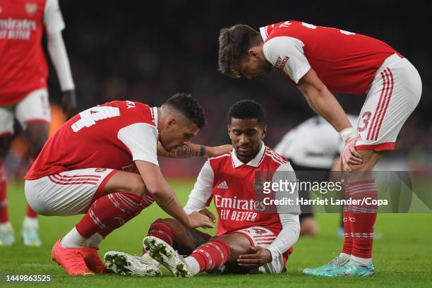 Reiss Nelson of Arsenal goes down injured during the mid-season friendly between Arsenal and Juventus at Emirates Stadium on December 17, 2022 in...