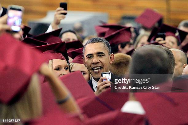 President Barack Obama mingles with Joplin High School graduates just before Monday night's commencement ceremony on May 21 in Joplin, Missouri.