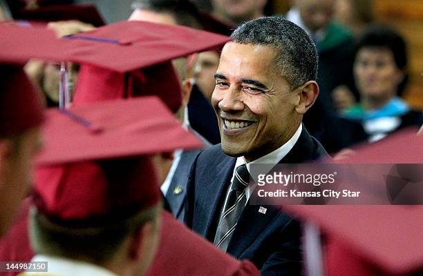 President Barack Obama mingles with Joplin High School graduates just before Monday night's commencement ceremony on May 21 in Joplin, Missouri.