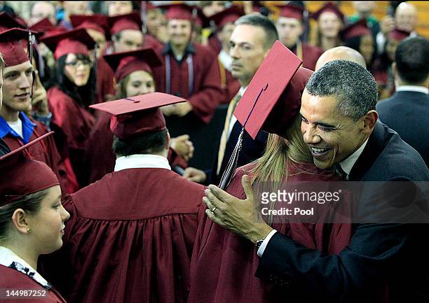 President Barack Obama greets Joplin High School graduates just before Monday night's commencement ceremony for the Class of 2012 at the Missouri...