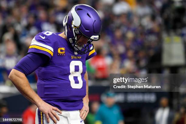 Kirk Cousins of the Minnesota Vikings reacts during the second quarter of the game against the Indianapolis Colts at U.S. Bank Stadium on December...