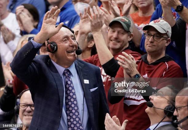 Sportscaster Dick Vitale waves to the crowd as he is honored during a game between Indiana Hoosiers and Kansas Jayhawks in the first half at Allen...