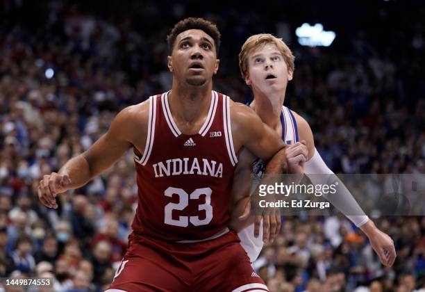 Trayce Jackson-Davis of the Indiana Hoosiers blocks out Gradey Dick of the Kansas Jayhawks on a free throw attempt in the first half at Allen...