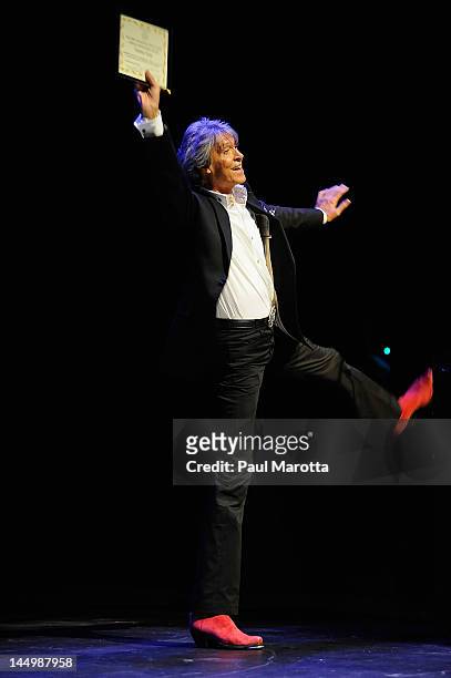 Tommy Tune performs at the 2012 Boston Theater Critics Association Elliot Norton Awards at the Paramount Theatre on May 21, 2012 in Boston,...