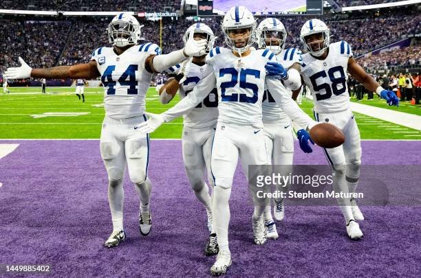 Rodney Thomas II of the Indianapolis Colts celebrates with teammates after an interception against the Minnesota Vikings during the fourth quarter of...
