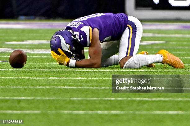 Justin Jefferson of the Minnesota Vikings reacts during the fourth quarter of the game against the Indianapolis Colts at U.S. Bank Stadium on...