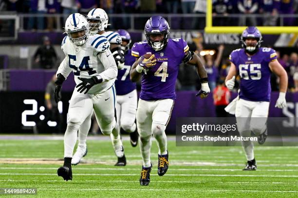 Dalvin Cook of the Minnesota Vikings rushes for a touchdown against the Indianapolis Colts during the fourth quarter of the game at U.S. Bank Stadium...