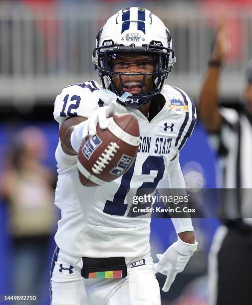 Travis Hunter of the Jackson State Tigers reacts after pulling in a touchdown reception against the North Carolina Central Eagles during the second...