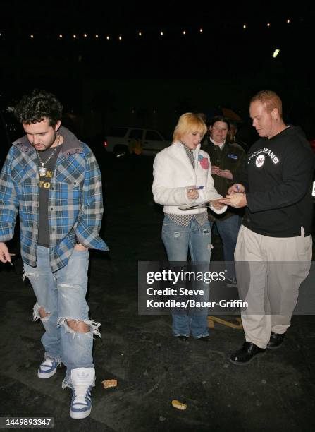 Trace Ayala and Elisha Cuthbert are seen on December 03, 2004 in Los Angeles, California.