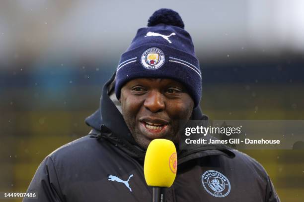 Shaun Goater looks on during the friendly match between Manchester City and Girona at Manchester City Academy Stadium on December 17, 2022 in...