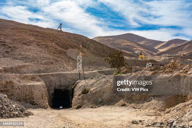 Old wooden headframe and original underground entrance at the 2010 San Jose Mine accident site near Copiapo, Chile. The yellow lifting frame at was...