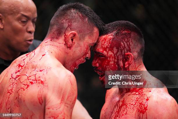 Maheshate of China and Rafa Garcia face off during their lightweight fight during the UFC Fight Night event at UFC APEX on December 17, 2022 in Las...
