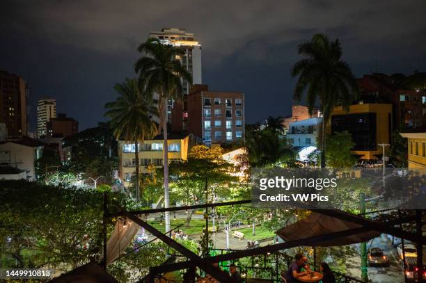 Night view of Cali skyline and El Pe√±on area from Elsa Cafe restaurant, Colombia