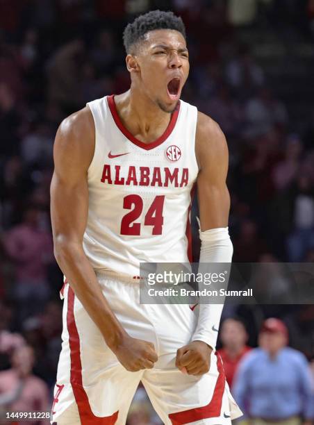 Brandon Miller of the Alabama Crimson Tide celebrates after knocking down a three pointer during the second half against the Gonzaga Bulldogs at...