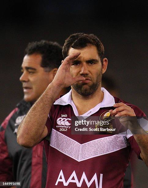 Maroons coach Mal Meninga and captain Cameron Smith look on during a Queensland Maroons State of Origin captain's run at Etihad Stadium on May 22,...