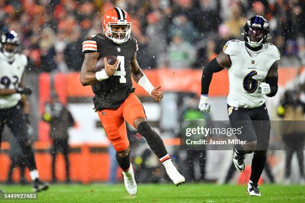 Deshaun Watson of the Cleveland Browns carries the ball against the Baltimore Ravens during the fourth quarter at FirstEnergy Stadium on December 17,...