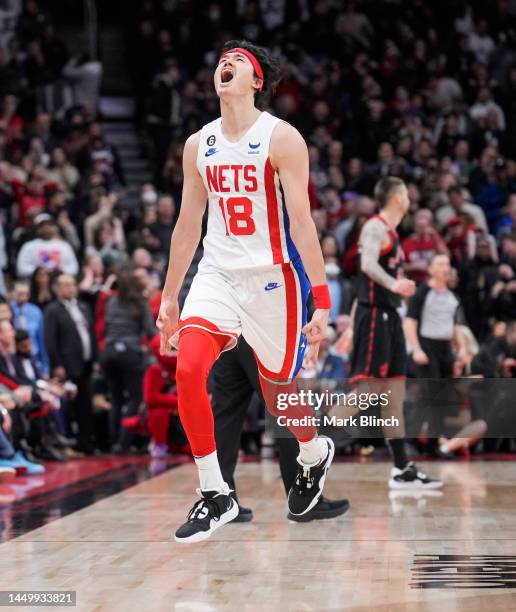 Yuta Watanabe of the Brooklyn Nets celebrates hitting a three point shot against the Toronto Raptors during the second half of their basketball game...