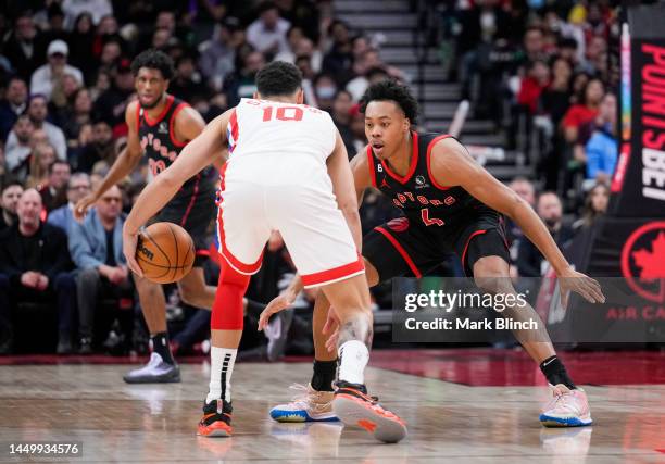 Ben Simmons of the Brooklyn Nets is guarded by Scottie Barnes of the Toronto Raptors during the second half of their basketball game at the...