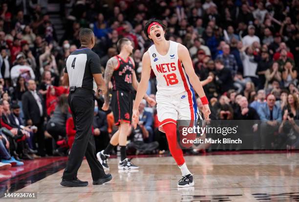 Yuta Watanabe of the Brooklyn Nets celebrates hitting a three point shot against the Toronto Raptors during the second half of their basketball game...