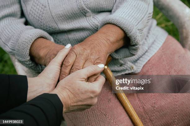 home caregiver visit - volunteer aged care stock pictures, royalty-free photos & images