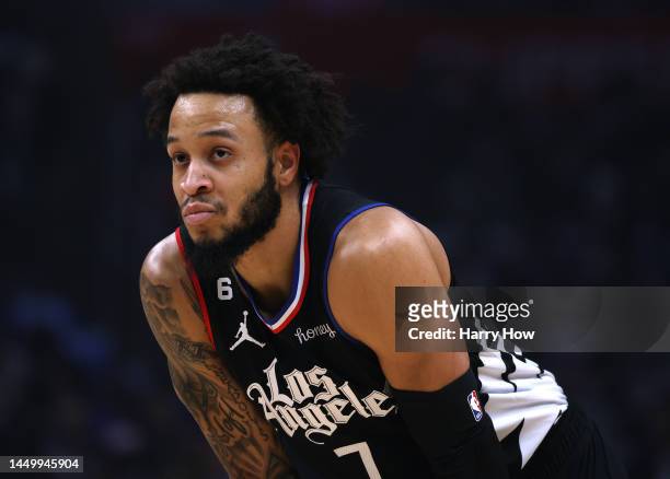 Amir Coffey of the LA Clippers waits to play during a 111-95 loss to the Phoenix Suns at Crypto.com Arena on December 15, 2022 in Los Angeles,...