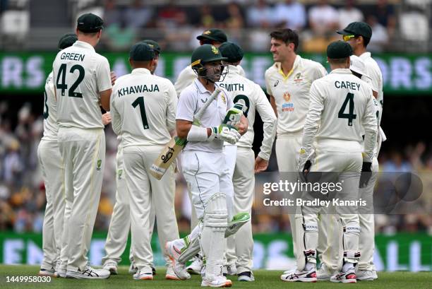 Dean Elgar of South Africa looks dejected after losing his wicket to Pat Cummins of Australia during day two of the First Test match between...