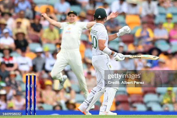 Sarel Erwee of South Africa watches on as Cameron Green of Australia catches him out during day two of the First Test match between Australia and...