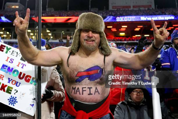 Buffalo Bills fan poses for a photo during the first half of the game against the Miami Dolphins at Highmark Stadium on December 17, 2022 in Orchard...