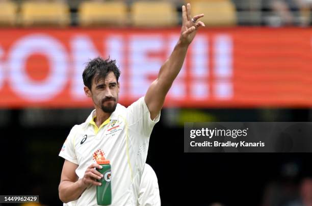 Mitchell Starc of Australia celebrates taking his 300th Test Wicket after bowling out Rassie van der Dussen of South Africa during day two of the...