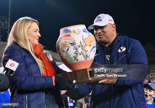 Head coach Kalani Sitake of the Brigham Young Cougars accepts the New Mexico Bowl trophy after the Cougars defeated the SMU Mustangs in the New...