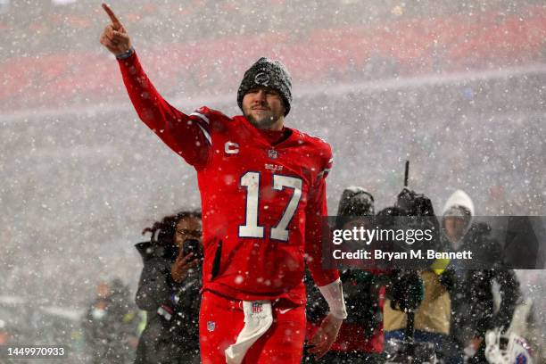 Josh Allen of the Buffalo Bills runs off the field after defeating the Miami Dolphins at Highmark Stadium on December 17, 2022 in Orchard Park, New...