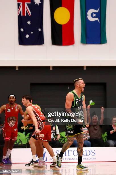 Mitchell Creek of the Phoenix celebrates the win in double overtime during the round 11 NBL match between South East Melbourne Phoenix and Sydney...