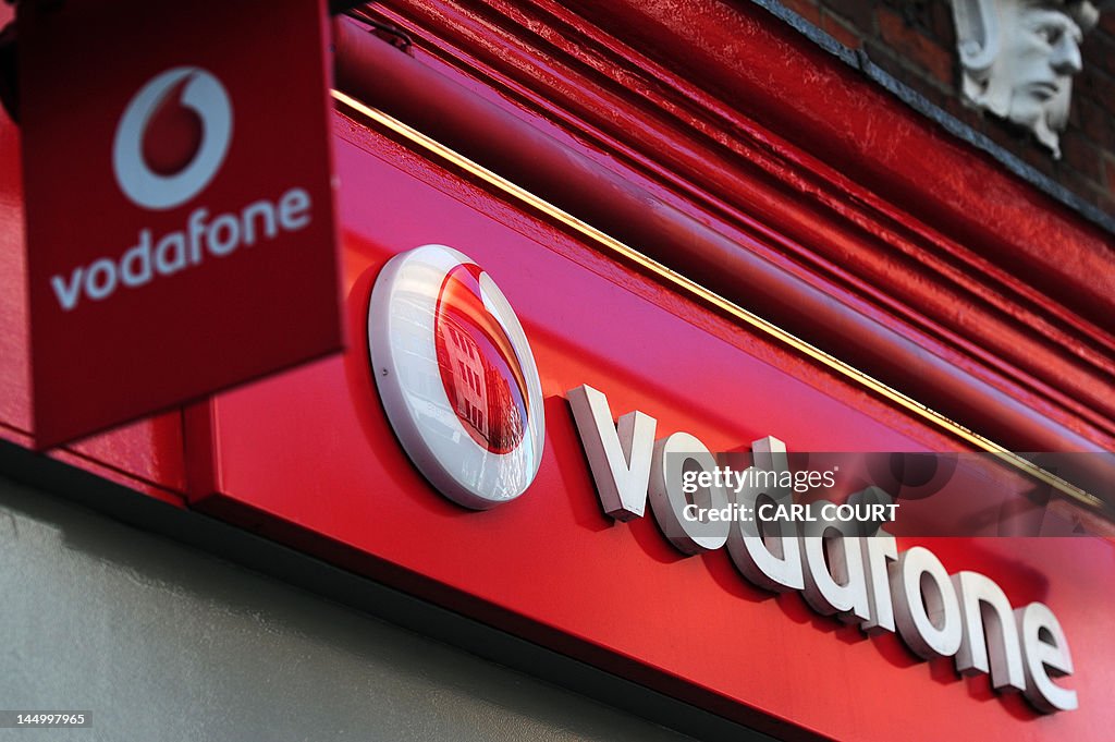 A sign for a Vodafone store is pictured 