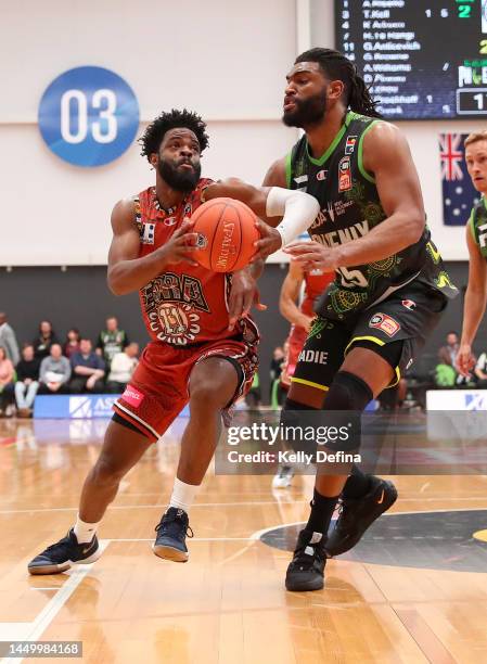 Derrick Walton Jr of the Kings drives to the basket against Alan Williams of the Phoenix during the round 11 NBL match between South East Melbourne...
