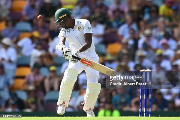 Kagiso Rabada of South Africa evades a ball during day two of the First Test match between Australia and South Africa at The Gabba on December 18,...