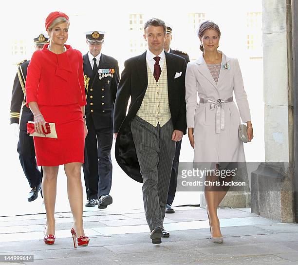 Princess Maxima of the Netherlands, Prince Frederik of Denmark and Princess Madeleine of Sweden attend the christening of new Swedish heir to the...