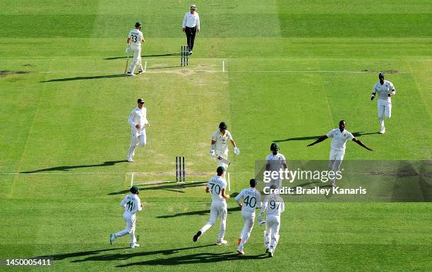 David Warner of Australia is seen walking from the field after losing his wicket to Kagiso Rabada of South Africa during day two of the First Test...