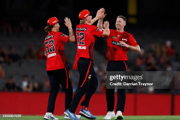 Tom Rogers of the Renegades celebrates the wicket of Jason Sangha of the Thunder during the Men's Big Bash League match between the Melbourne...