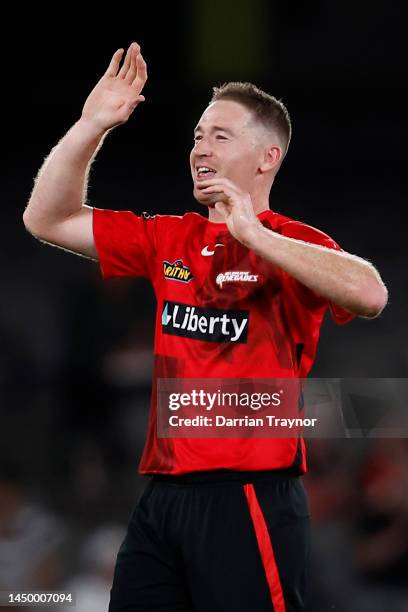 Tom Rogers of the Renegades celebrates the wicket of Jason Sangha of the Thunder during the Men's Big Bash League match between the Melbourne...