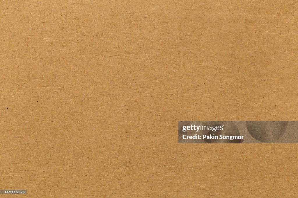 Brown paper sheet texture cardboard background.