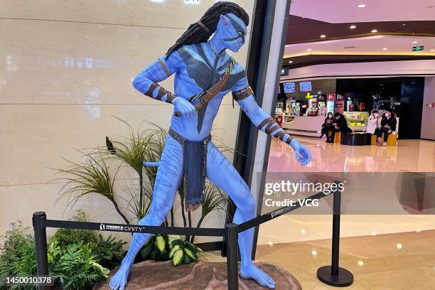 An Avatar figurine is displayed at the entrance of a cinema on December 17, 2022 in Beijing, China.