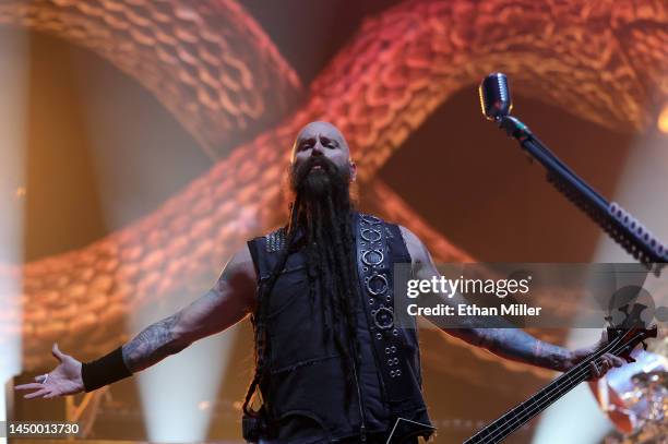 Bassist Chris Kael of Five Finger Death Punch performs at Michelob ULTRA Arena on December 17, 2022 in Las Vegas, Nevada.