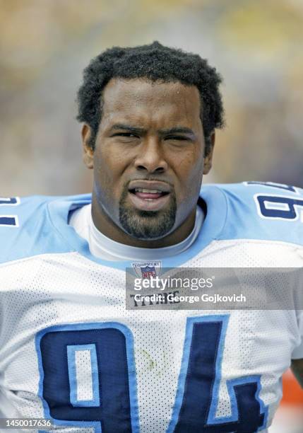 Defensive lineman Juqua Parker of the Tennessee Titans looks on from the sideline during a game against the Pittsburgh Steelers at Heinz Field on...
