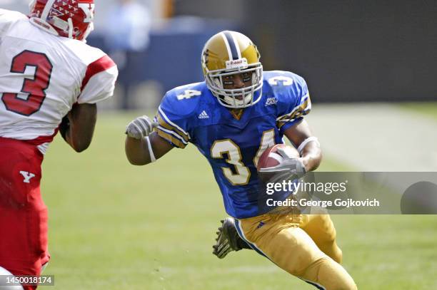 Running back LaRod Stephens-Howling of the University of Pittsburgh Panthers runs with the football against the Youngstown State Penguins during a...