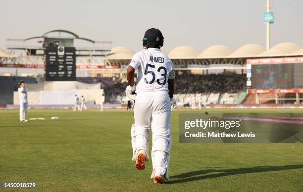 Rehan Ahmed of England walks out to bat during Day Two of the Third Test between Pakistan and England at Karachi National Stadium on December 18,...