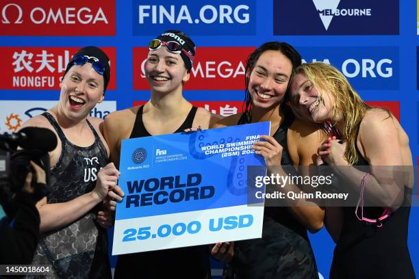 Torri Huske, Claire Curzan, Lilly King and Kate Douglass of the United States celebrate winning gold in the Women's 4x100m Medley Relay Final, in a...