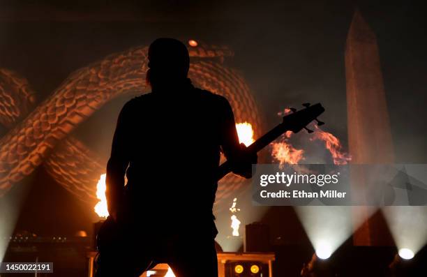 Bassist Chris Kael of Five Finger Death Punch performs at Michelob ULTRA Arena on December 17, 2022 in Las Vegas, Nevada.