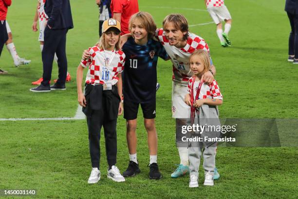 Luka Modric of Croatia poses with his children , Ema, Ivano and Sofia after the 3rd place medal ceremony following the final whistle of the FIFA...