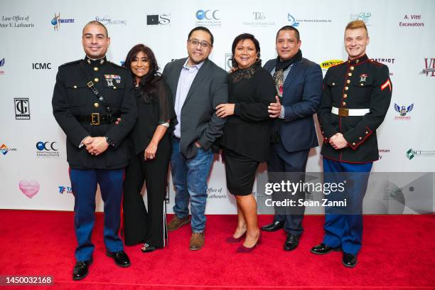 Jonathan Echavarria, Jenny Castelano, Marco Reinoso, Carina Reinoso, Juan Carlos and PFC Nicholas Savona attend Tarzia Foundations 7th Annual Toys...