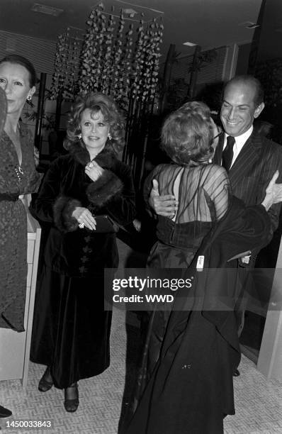 Designer Oscar de la Renta and socialite and theater producer Irene Mayer Selznick, editor Francoise de la Renta and guest.